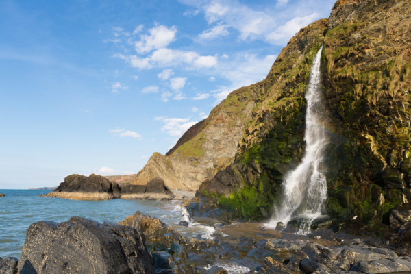 Waterfall at Tresaith Beach, Cardigan Bay, Wales.