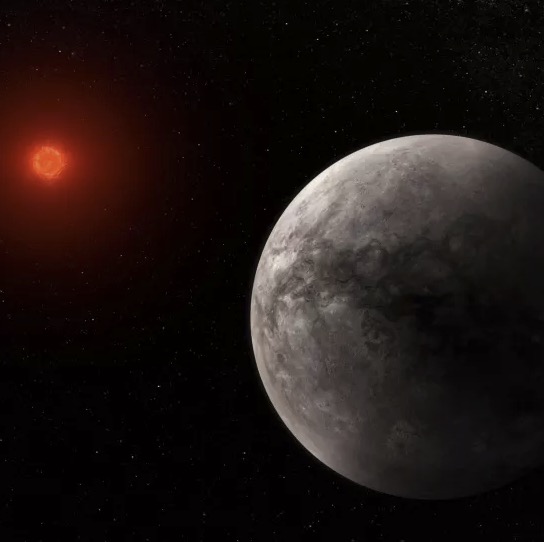 An illustration of the rocky, Earth-like planet TRAPPIST 1-b, with its small red sun blazing in the distance. (Image credit: NASA, ESA, CSA, J. Olmsted (STScI))