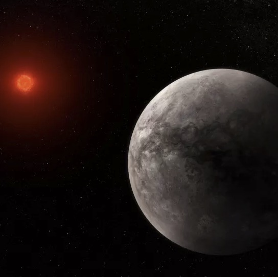 An illustration of the rocky, Earth-like planet TRAPPIST 1-b, with its small red sun blazing in the distance. (Image credit: NASA, ESA, CSA, J. Olmsted (STScI))
