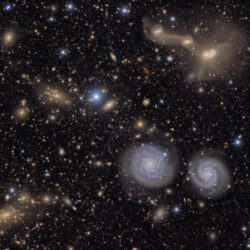 A piece of the Rubin Observatory's view of the Virgo Cluster featuring spiral galaxies and merging galaxies. (Image credit: NSF–DOE Vera C. Rubin Observatory)