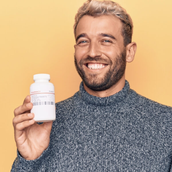 man with pills - male birth control pill - deposit photos